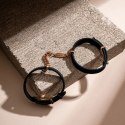 Crave - ID Cuffs Mankiety skórzane czarne z różowym złotem Crave